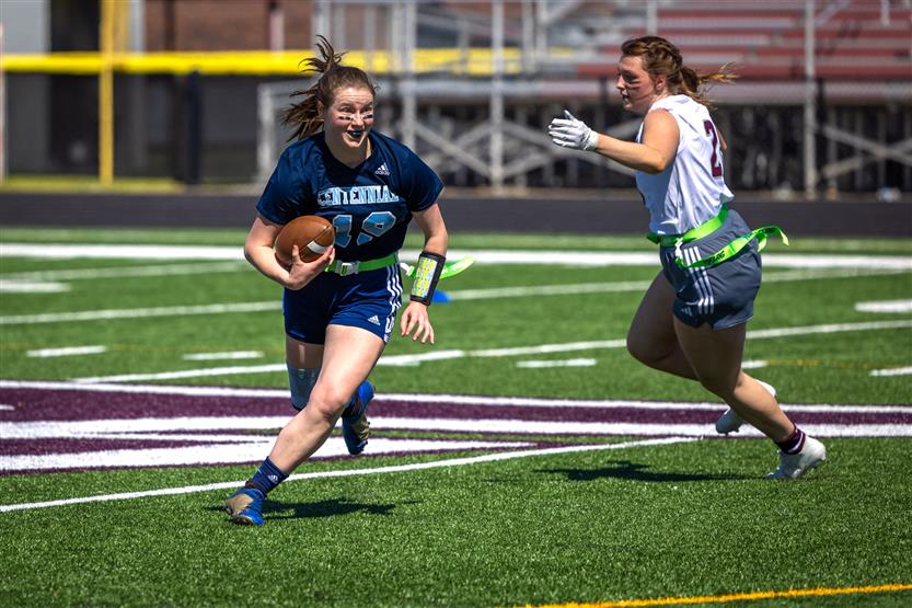 Students play flag football